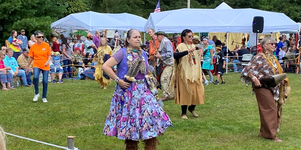 As vendors finished their setup, Ernie Strong Bear, Cherokee, circled the area smudging with sweetgrass. As vendors finished their setup, Ernie Strong Bear, Cherokee, circled the area smudging with sweetgrass.
