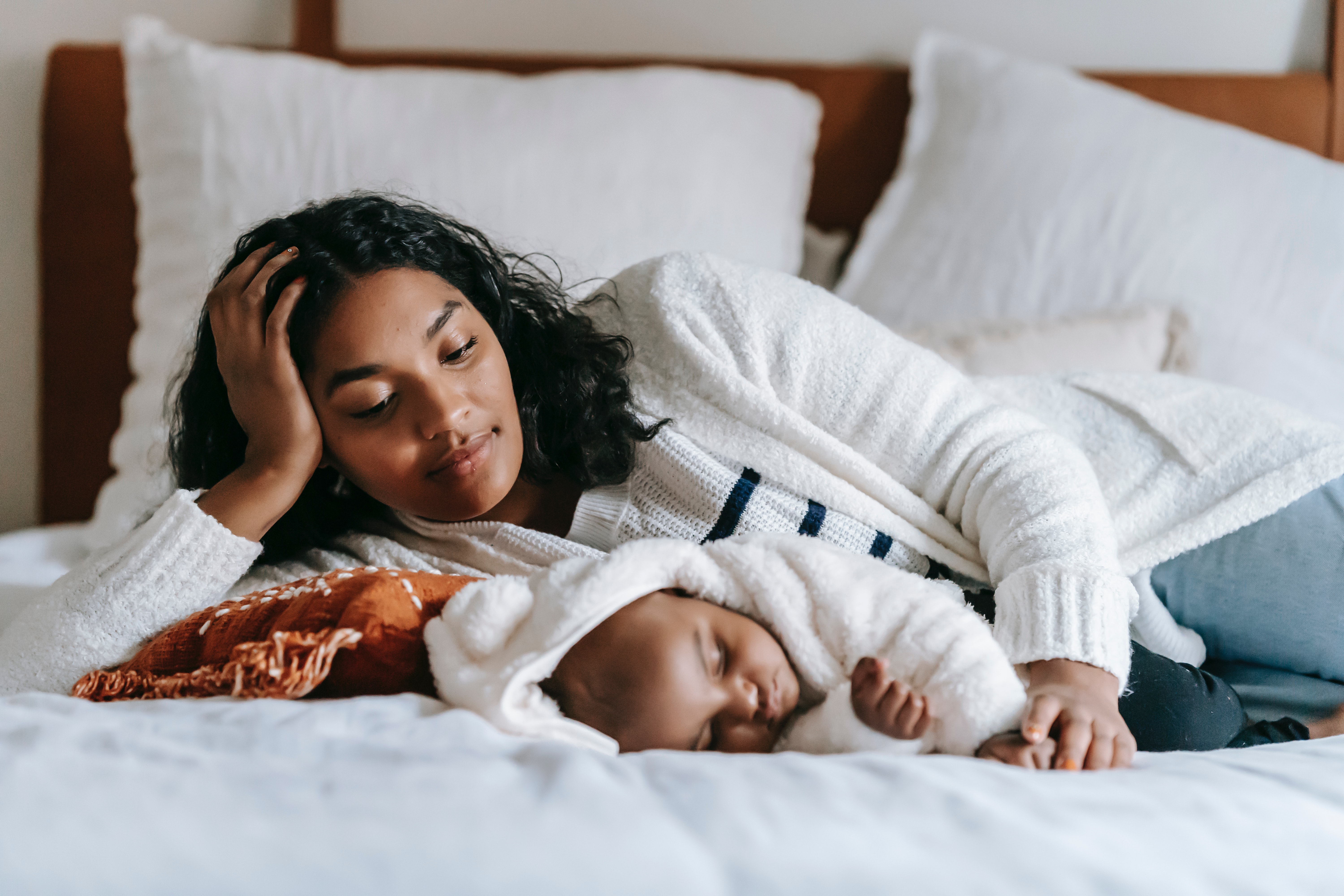 Conflicting emotions and challenging experiences can be constant companions for new parents. In every milestone, God is there, bringing comfort and love. Photo by William Fortunato by Pexels