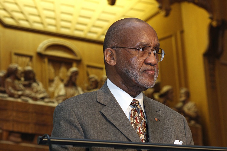 United Methodist Bishop Felton May was a local pastor in Chicago and served as master of ceremonies when the Rev. Martin Luther King Jr. came to speak on behalf of the Southern Christian Leadership Conference.