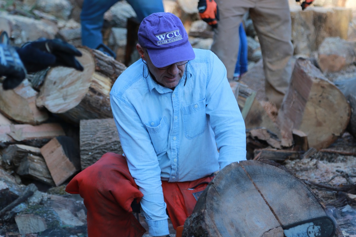 Pastor David Reeves at Cullowhee United Methodist Church volunteers for Project Firewood, a local church ministry to provide firewood to neighbors. Photo by Matthew Broomell