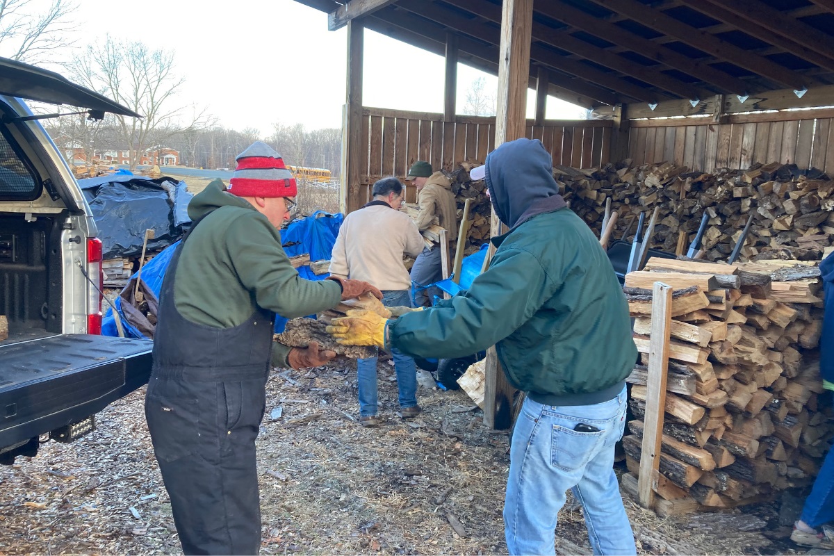 Ebenezer United Methodist Church volunteers spend time cutting, stacking and delivering wood to their neighbors. Photo by Bo Tye