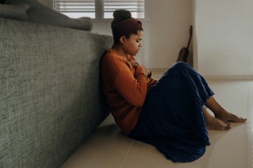 An anxious young woman seeks help finding the road back to peace.