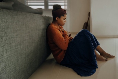 An anxious young woman seeks help finding the road back to peace.