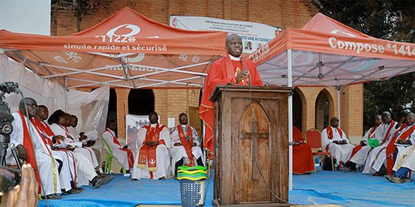 Bishop Mande Muyombo brings greetings from the United Methodist Council of Bishops during the 100th anniversary celebration for the church in Eastern Congo. Photo by Philippe Kituka Lolonga, UM News. Bishop Mande Muyombo brings greetings from the United Methodist Council of Bishops during the 100th anniversary celebration for the church in Eastern Congo. Photo by Philippe Kituka Lolonga, UM News.