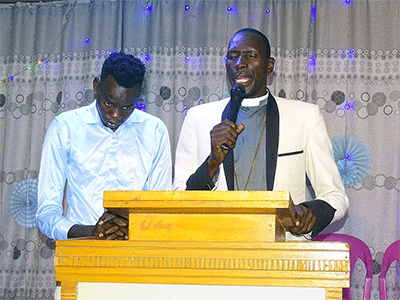 The Rev. Obang Olamo, senior pastor at Ethiopia United Methodist Church in Gambella, shares a sermon during Sunday worship service. A clash between separatists and government forces in western Ethiopia in June left 37 dead, including at least three members of Ethiopia United Methodist Church. Photo by Gad Maiga, UM News.