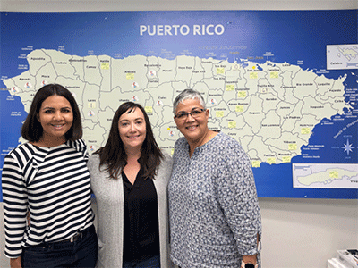 Glorymar Rivera-Báez, executive director of REHACE, and Bishop Lizzette Gabriel Montalvo briefs Martin on the MCPR’s extensive response and recovery efforts for Hurricane Fiona. Photo: Erick Mercado Sanchez/Rehace