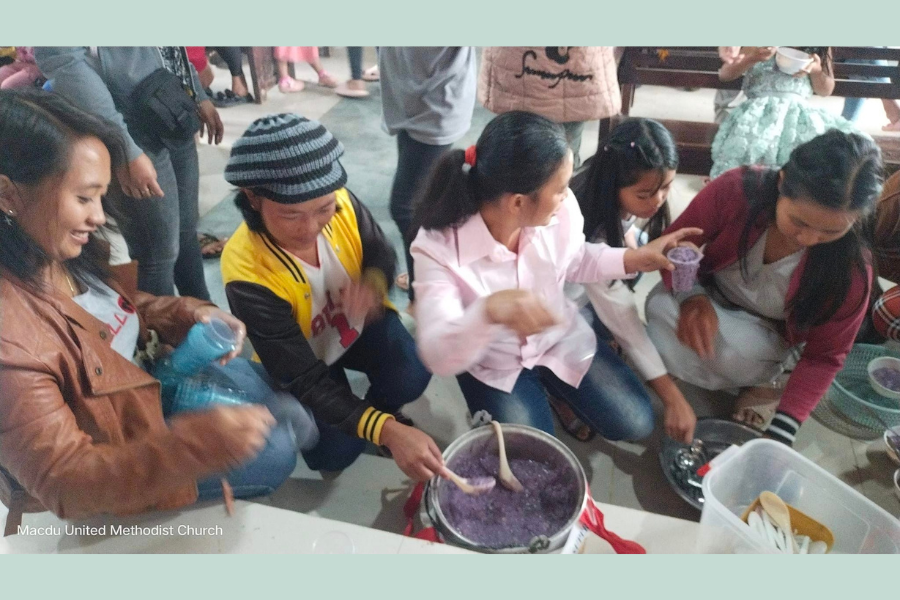 Members of Macdu UMC in the Philippines serve ube purple sweet potato