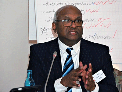 The Rev. Moses Kumar, top executive of The United Methodist Church’s finance agency, tells the Standing Committee on Central Conference Matters about the agency’s plan to send a significantly lower budget to General Conference in 2024. The budget would require a reduction of bishops around the globe. That has bearing on the standing committee’s proposal to add five bishops in Africa. Photo by Klaus Ulrich Ruof, Germany Central Conference.