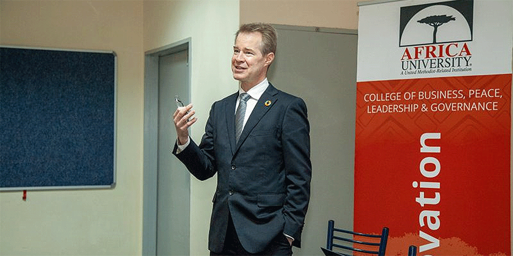 Professor Paul Tsuchido Shew, Vice Chancellor of Aoyama Gakuin University in Tokyo, Japan delivers a special guest lecture to faculty and students from the Computer Sciences, Ethics and Theology classes on ChatGPT and its impact on higher education.