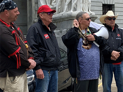 (From left) Chief Adam Waterbear DePaul, Director of Education and Tribal Story Keeper; Ken McCaulay, Tribal Council Member; Chief Chuck Gentlemoon Demund,, Keeper of Ceremony and Intertribal Liaison; and Elder Richard Welker, Tribal Council Member.