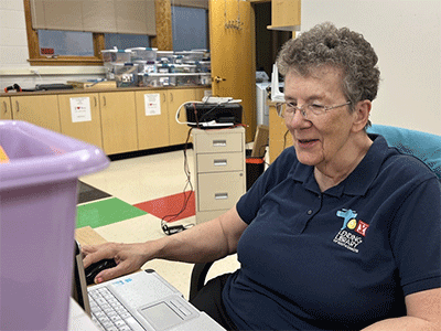 Andrine Stichers tracks donors and donations in a database for the Toy Lending Library at First UMC in Sioux Falls.
