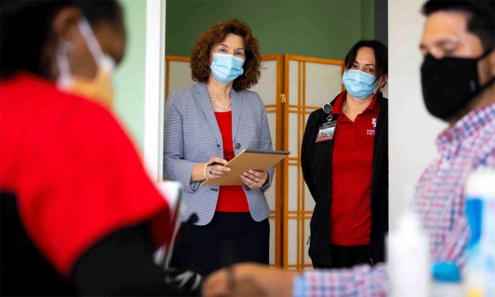 University of Houston faculty Dr. Teresa McIntyre and Dr. Andrea Brooks observe a practice run at a new clinic featuring both nurse-run care and telehealth services on Monday, Aug. 30, 2021. The clinic is located in one of St. Paul’s United Methodist downtown buildings on Fannin Street and is a partnership between the church and the University of Houston. Photo by Annie Mulligan.