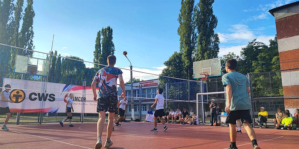 A volleyball sports tournament sponsored jointly by CWS and UMCOR makes summer feel more like summer for both Ukrainian and Moldovan youth and children. Photo: Courtesy CWS