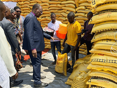 United Methodist Bishop Gabriel Yemba Unda of the East Congo Episcopal Area prays before launching a distribution operation in Goma, Congo, in July. The United Methodist Church provided food, hygiene kits and other essential support to thousands of displaced people in the country. Photo by Jolie Shabani, UM News.