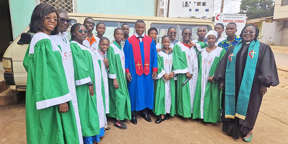Carlito Alberto (in blue robe) sings with the choir of the Jourdain UMC in Jourdain, Cameroon. (Photo: Courtesy of Carlito Alberto)