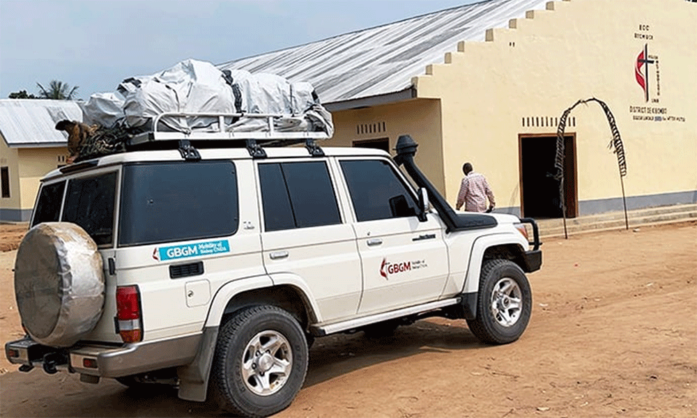 Each bishop in the Congo Central Conference, which includes four United Methodist episcopal areas covering six countries in central Africa, received an SUV with financial support from the United Methodist Board of Global Ministries. Here, one of the Land Cruisers sits in front of Victor Wetchi United Methodist Church in the Kibombo District in Congo. Photo by Chadrack Londe, UM News.