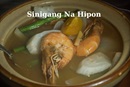 image shows a bowl of sinigang soup with shrimp image shows a bowl of sinigang soup with shrimp
