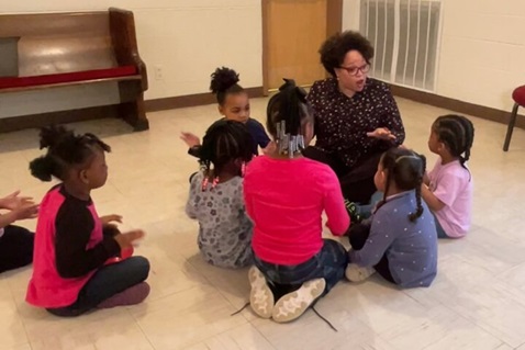 Quatrece McKinney volunteers with children at Community Care Fellowship in Nashville Tennessee Quatrece McKinney volunteers with children at Community Care Fellowship in Nashville Tennessee