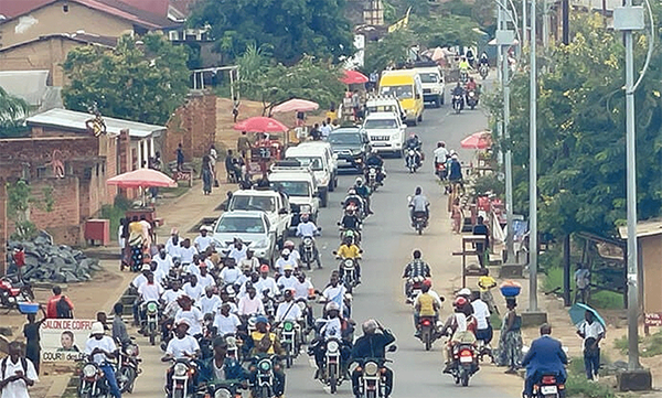 A caravan using loudspeakers to broadcast a call for peaceful elections makes its way through Kibombo, Congo. Photo by Chadrack Tambwe Londe, UM News. A caravan using loudspeakers to broadcast a call for peaceful elections makes its way through Kibombo, Congo. Photo by Chadrack Tambwe Londe, UM News.