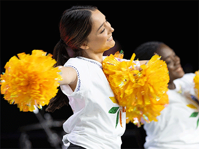 Dancers Annika Schneider (left) and Briana Hanson from United Methodist-related Pfeiffer University help introduce a report from United Women in Faith on April 29 during the United Methodist General Conference in Charlotte, N.C. Photo by Mike DuBose, UM News.