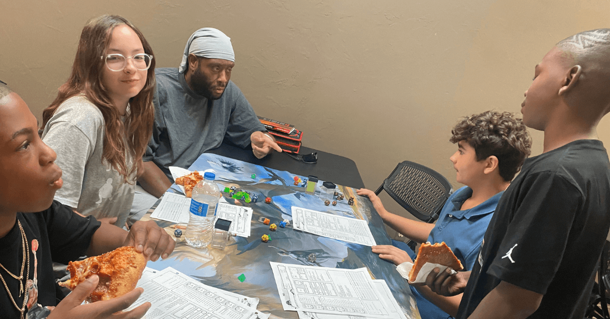 Oren Williams leads a Dungeons and Dragons game at Sanctuary Comics and Games