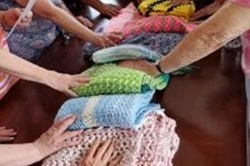 More than 550 prayer shawls and other items have been knitted and distributed by a Bound Brook UMC ministry to those in need of a comforting presence. Courtesy of Greater NJ Conference