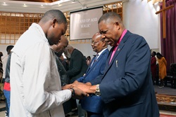 Central Congo Bishop Daniel O. Lunge (from right), East Congo Bishop Gabriel Yemba Unda and other episcopal leaders pray for members of the Africa University community during a worship service Sept. 4 in the Kwang Lim Chapel on campus at the Africa Colleges of Bishops retreat in Mutare, Zimbabwe. During the Sept. 2-5 meeting, 11 episcopal leaders from the continent pledged their support for worldwide regionalization and expressed a commitment to remain in The United Methodist Church. Photo by Eveline Chikwanah, UM News.