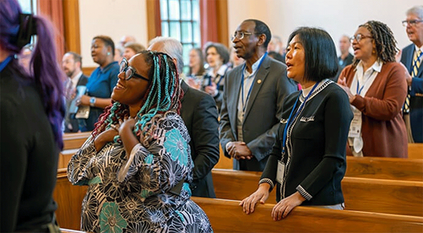 Agency staff and members of the boards of United Methodist Global Ministries and Higher Education and Ministry sing during opening worship at a joint board meeting on Oct. 14 at the Denman Building in Nashville, Tenn. Photo by Adam Bowers, United Methodist Board of Global Ministries.