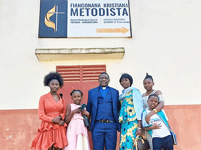 The Rev. Éric Kalumba is pictured with his family after their first service at Ambodifasika United Methodist Church in Ambodifasika, Madagascar. Kalumba is a United Methodist missionary from Congo assigned to Madagascar. Photo by Esdras Rakotoarivony, UM News.