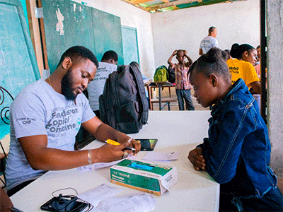 Staff of CHFF meet with children and adolescents in their schools through a mobile clinic to assess their health and provide needed medicines. (Photo: CHFF)