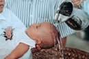 A baby is baptized