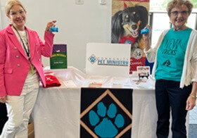 Betsy Snyder Singleton (left) and Gayle Fiser lead the pet ministry at Pinnacle View United Methodist Church. They are on a mission to share the possibilities of animal-related ministries with others. Photo courtesy of Gayle Fiser.