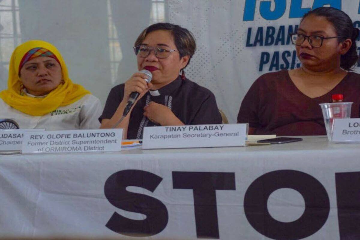 Rev. Glofie Baluntong (2nd from Left) in a press conference addressing human rights issues in Mindoro, Philippines. On Rev. Baluntong's right is Amirah Lidasan of Sandugo, a Moro-Christian Alliance in the Philippines and on Rev. Baluntong's left is Tinay Palabay of Karapatan, a Human Rights watch organization in the Philippines.