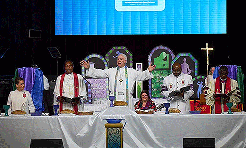 During the opening worship service of the 2024 General Conference, five United Methodist bishops from around the world celebrate communion with participants. The role of bishops as general superintendents is one of the few non-negotiable requirements in The United Methodist Church. Photo by Paul Jeffrey, UM News.
