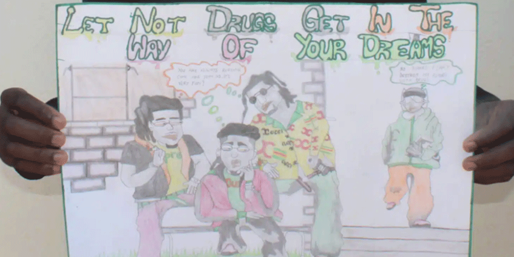 Darven Mutoyi, 16, showcases his prize-winning artwork in a competition aimed to promote awareness of the dangers of drug abuse at Chinyauhwera High School in The United Methodist Church’s Zimunya Central Circuit, in the Mutare area of Zimbabwe, as part of the Pillars & Plants program. Photo by Kudzai Chingwe.