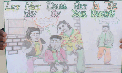 Darven Mutoyi, 16, showcases his prize-winning artwork in a competition aimed to promote awareness of the dangers of drug abuse at Chinyauhwera High School in The United Methodist Church’s Zimunya Central Circuit, in the Mutare area of Zimbabwe, as part of the Pillars & Plants program. Photo by Kudzai Chingwe.