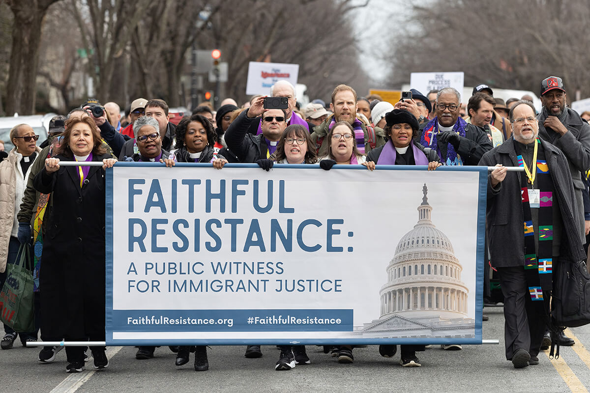 United Methodists and other faith leaders march toward the U.S. Capitol on Feb. 25 during “Faithful Resistance: A Public Witness for Immigrant Justice” in Washington. Holding the left end of the banner are United Methodist Bishops Minerva Carcaño, LaTrelle Easterling and Cynthia Moore-Koikoi. Photo by Mike DuBose, UM News.