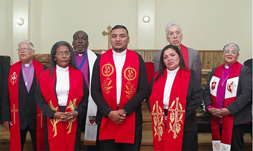 Front row, newly ordained elders: the Rev. María Magdalena Zelaya Cruz, the Rev. Héctor Mauricio Laínez Rodríguez and the Rev. Juana Jamileth Moncada Torres. Second row: Bishops José Roberto Peña Nazario, Juan Miguel Simpson Bennett, Rubén Sáenz Jr. and Lizette Gabriel Montalvo. Photo: Gustavo Vásquez, UM News.