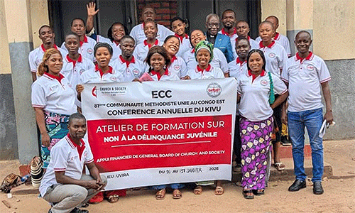 United Methodist youth leaders hold up a joint statement they prepared at the end of a training workshop in Uvira, Congo. The participants committed to promoting and restoring peace in their communities. Photo by Philippe Kituka Lolonga, UM News.
