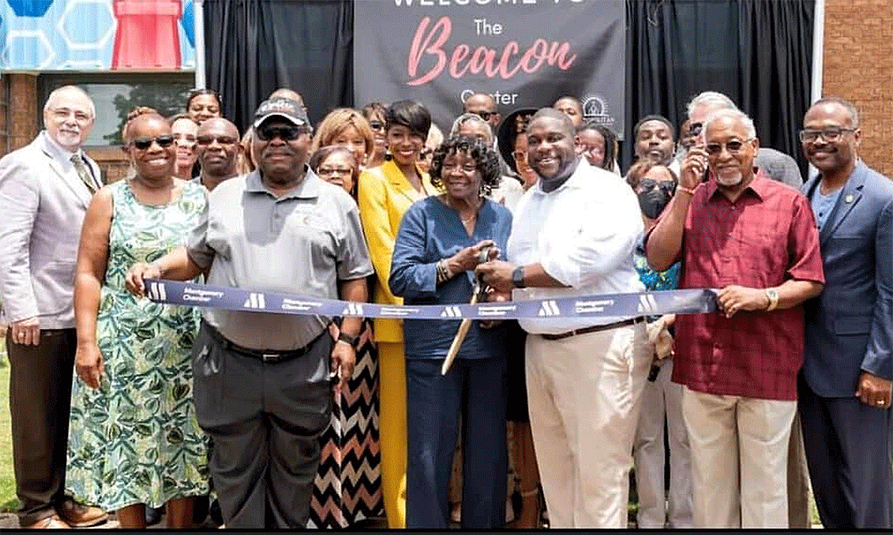 Ribbon-cutting ceremony (July 2022) for the Beacon Center in Montgomery, Alabama, a ministry of Metropolitan UMC. Rev. Richard WIlliams, first row, second from right, in the white shirt. Photo: Courtesy of Metropolitan UMC