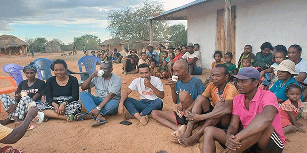 United Methodist evangelists share a drink in Ankilimidega, Madagascar, one of several locations they visited in the southern part of the island nation. The team conducted open-air campaigns and house-to-house outreach in communities where there had never been a church and Christianity was new to many. Photo by Tinasoa Tsimanavaka, UM News.