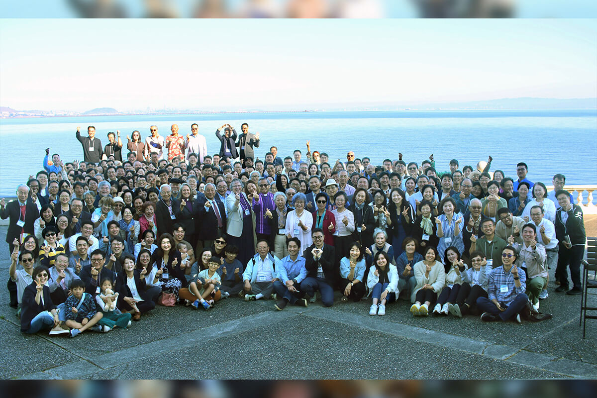 Participants in the Korean Association of The United Methodist Church’s 50th anniversary convocation pose with San Francisco Bay behind them after morning worship Oct. 6. The theme of the Oct. 5-8 gathering in Burlingame, Calif., was “Encounter, Engage, Empower.” Photo by the Rev. Eung-Sun Kim, UM News.