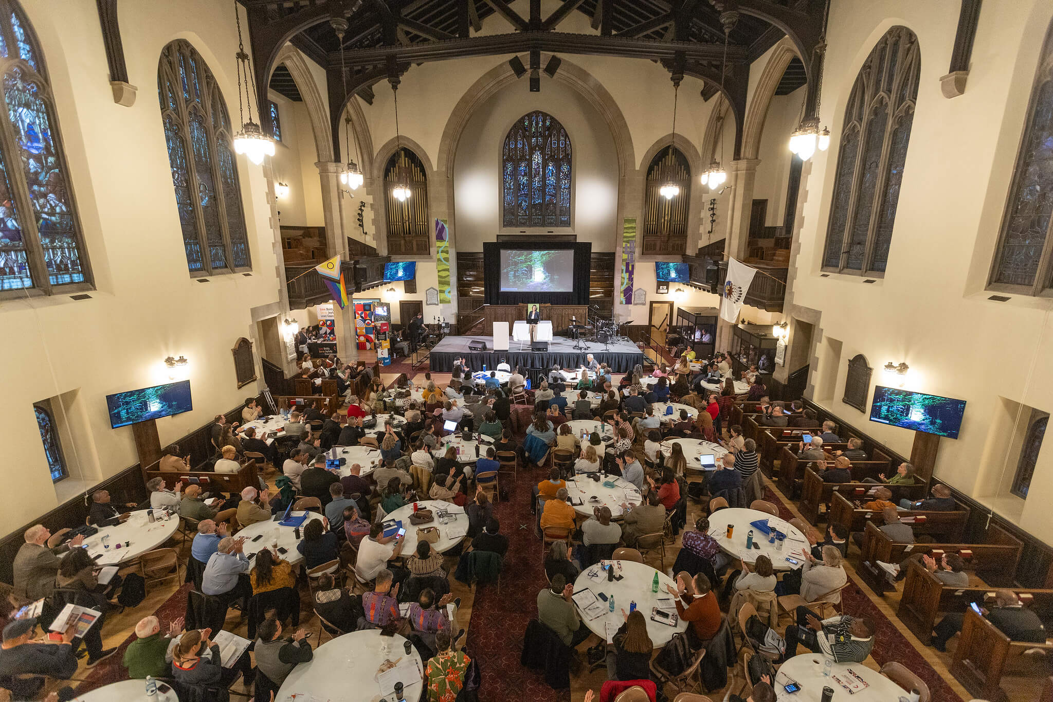 Participants in the United Methodist Leadership Gathering listen to a presentation in the sanctuary at Knox United Church in Calgary, Canada. (Photo by Mike DuBose, UM News.)